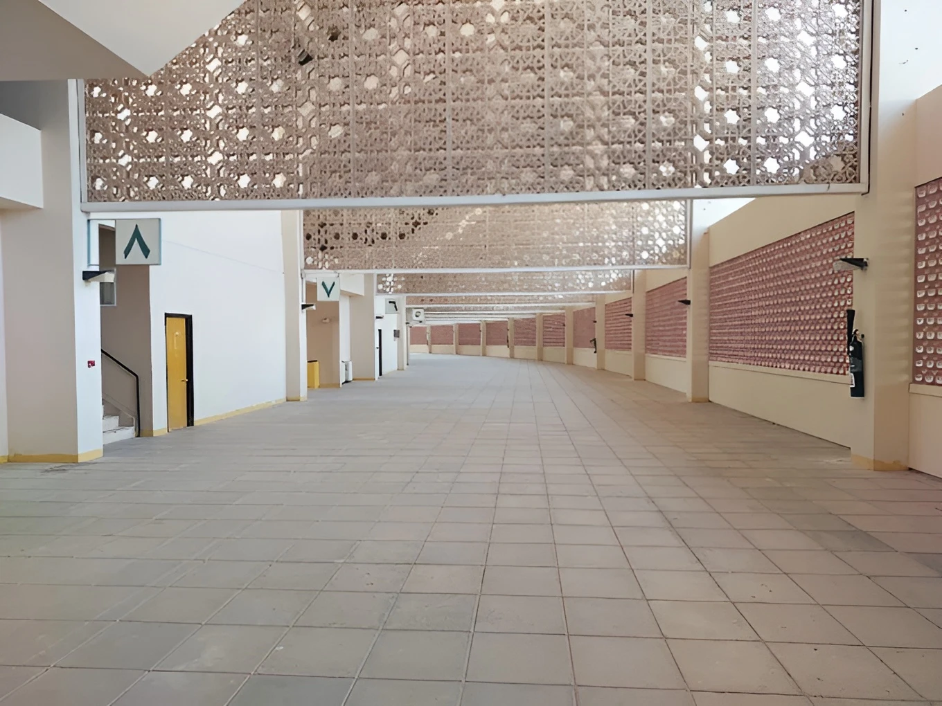 Spacious corridor at King Khalid Sport City Stadium, Tabuk.