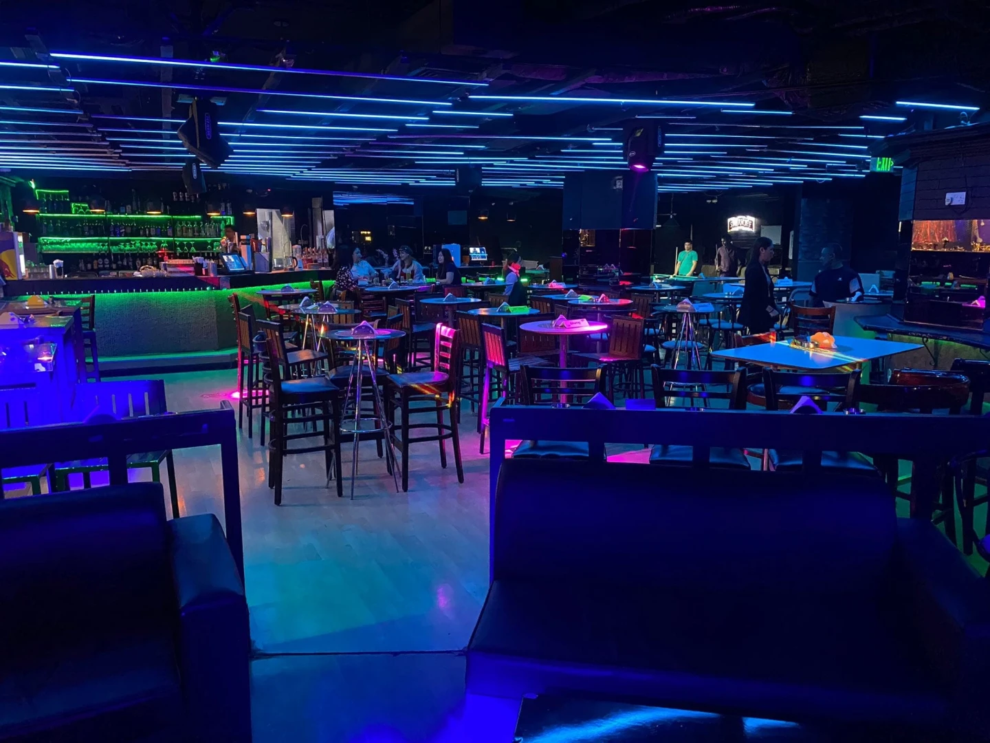 Maharlika Night Club Doha vibrant interior with neon lighting