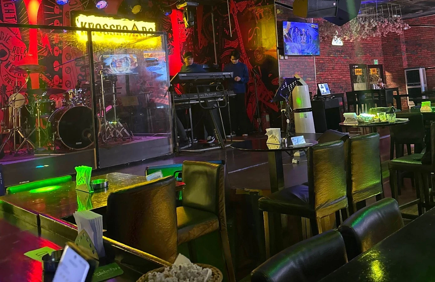 Krossroads Club Doha interior with stage and seating area.