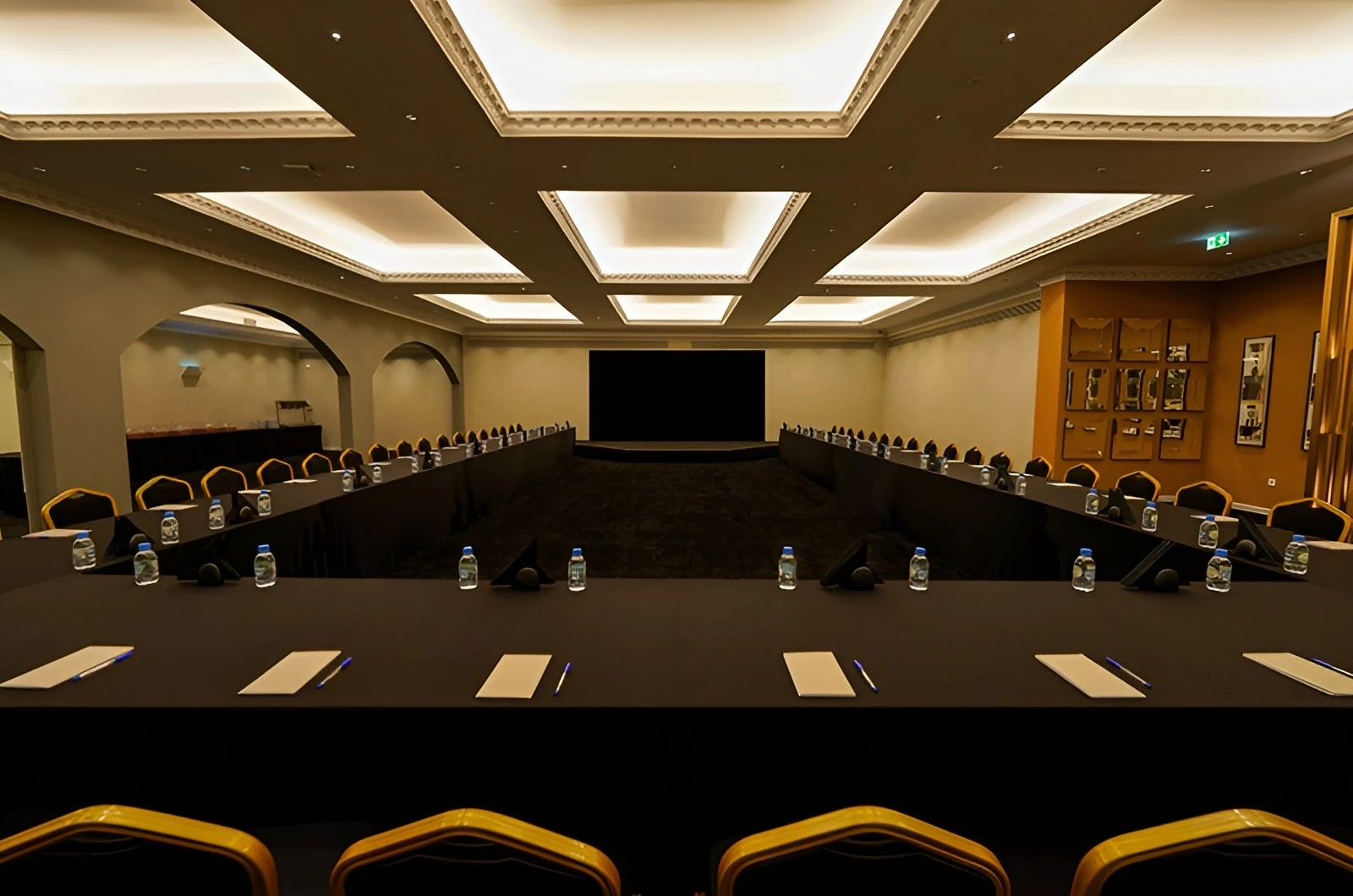 Conference room setup at U Venue Doha with U-shaped table.