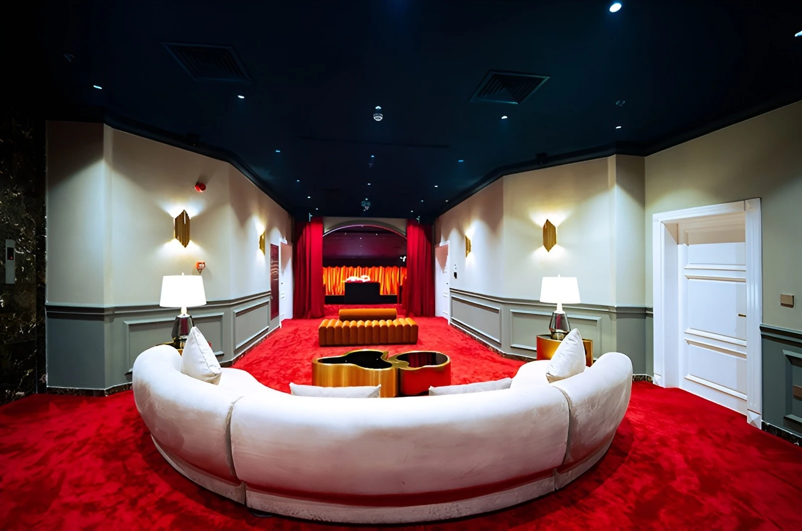 Luxurious lounge with red carpet at U Venue Doha.