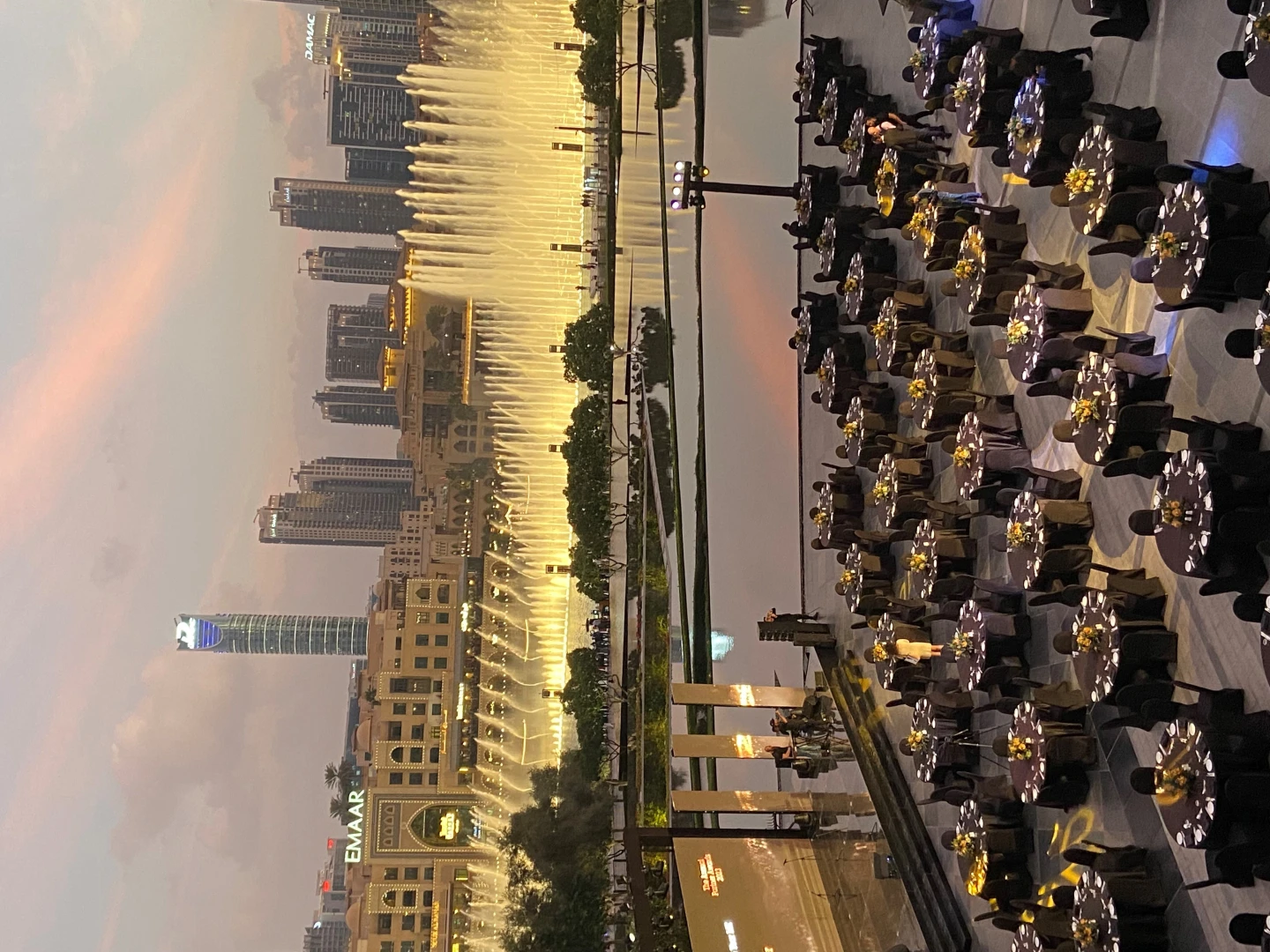 Elegant outdoor dining with fountain backdrop at Armani Hotel Dubai.