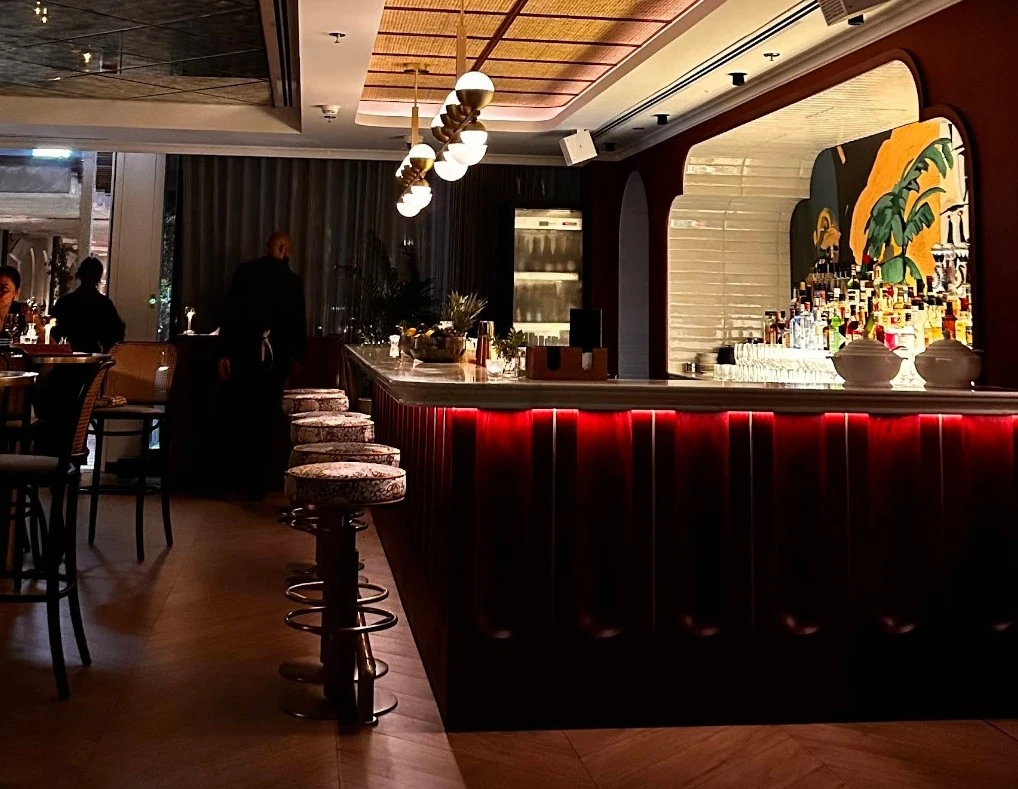 Elegant bar interior at Do Tell Bahrain, Manama with ambient lighting.