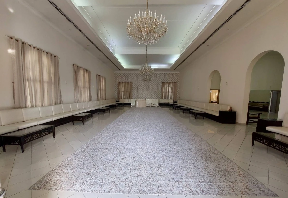 Spacious hall with chandeliers, Fatima Kanoo Hall, Manama.