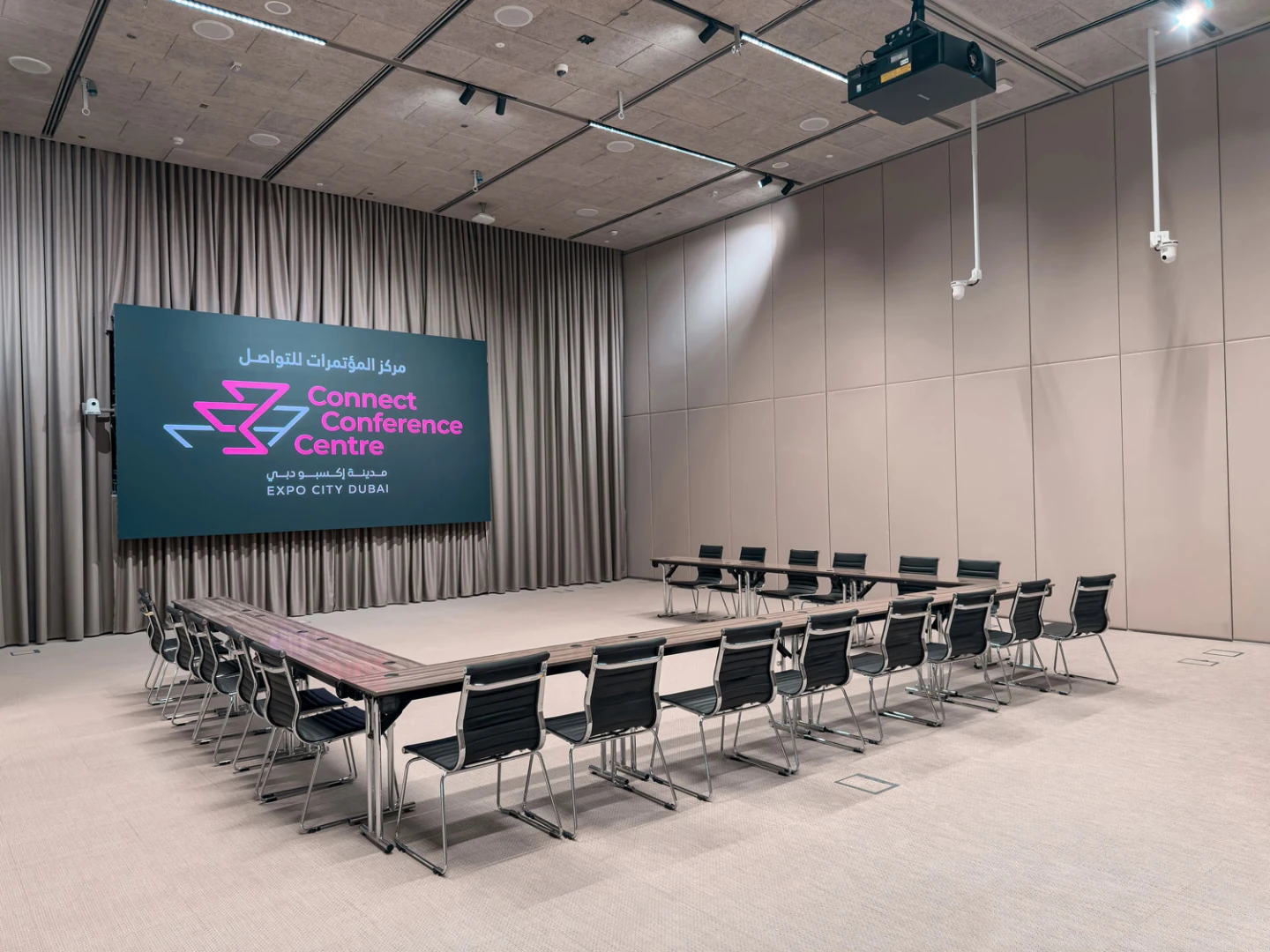 Connect Conference Centre Dubai, modern interior with conference seating arrangement.