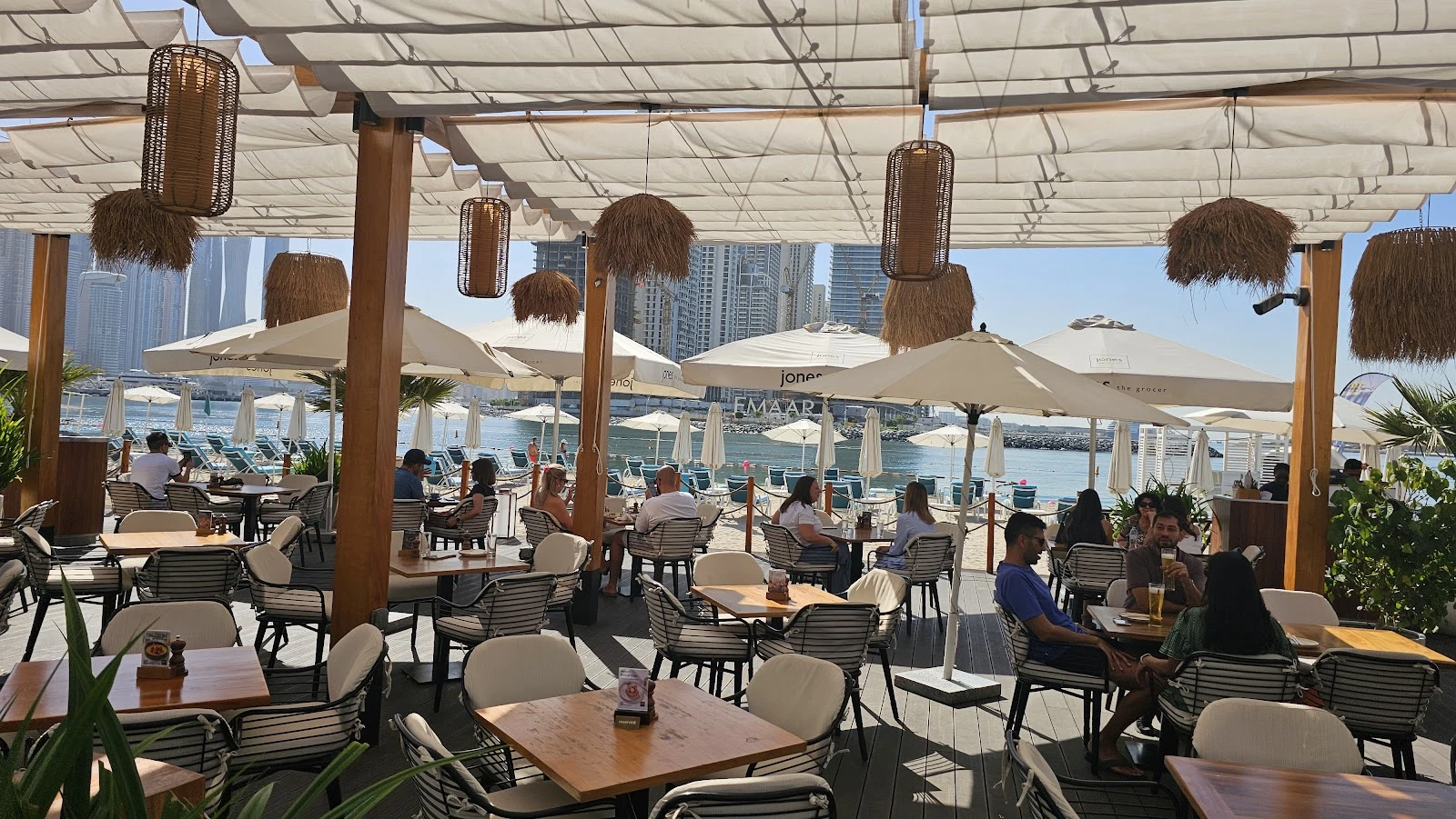 Outdoor seating at Jones the Grocer, The Palm Jumeirah, Dubai.