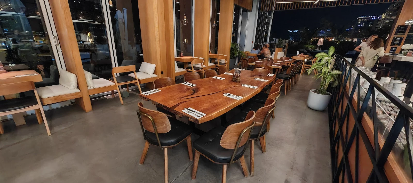 Elegant dining area at Jones the Grocer, The Palm Jumeirah, Dubai.