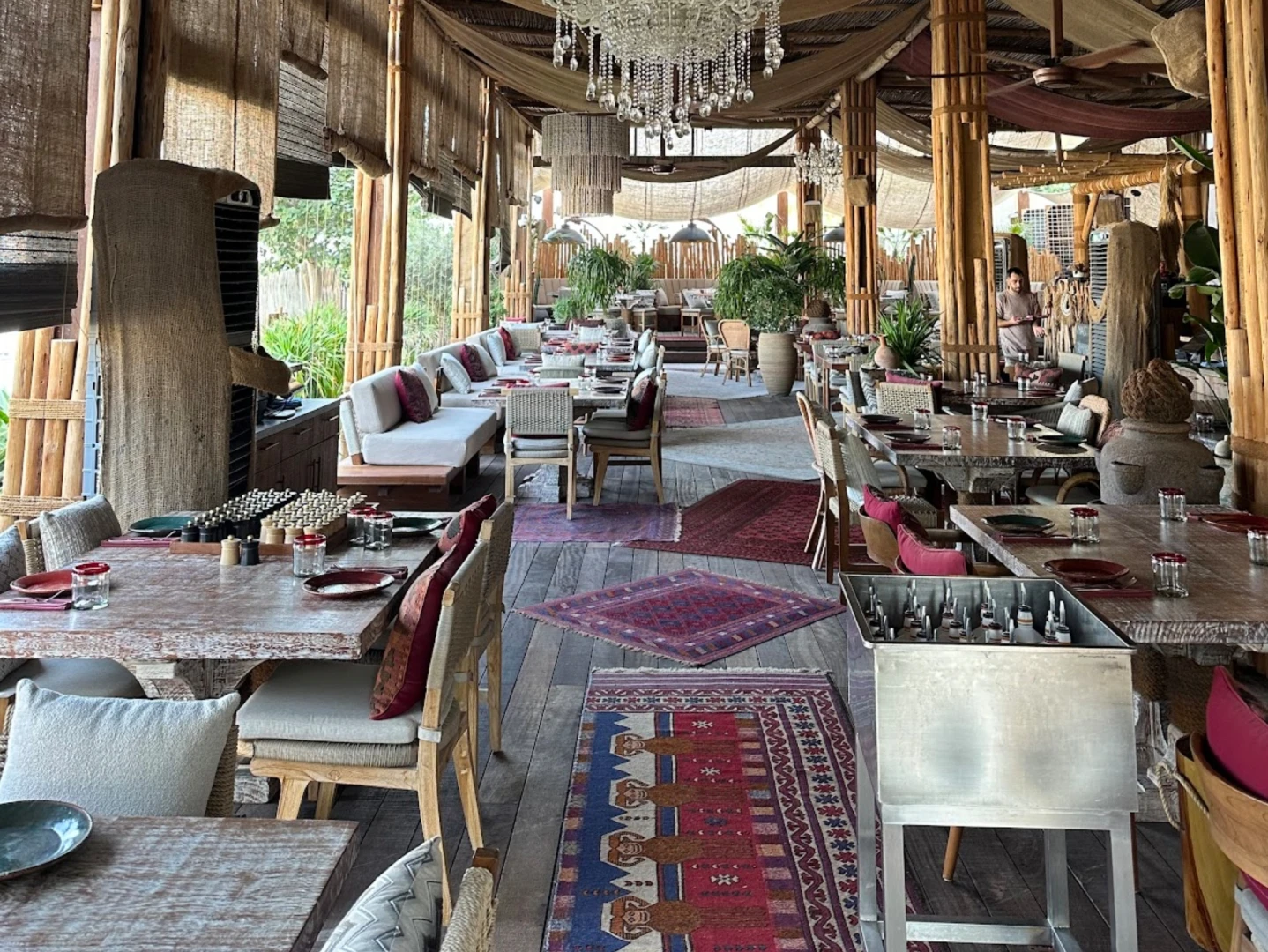 Elegant interior of Casa Amor Dubai with rustic decor and seating.