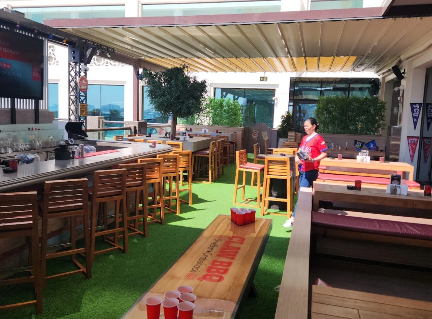CLAW BBQ The Palm outdoor seating area in Dubai.