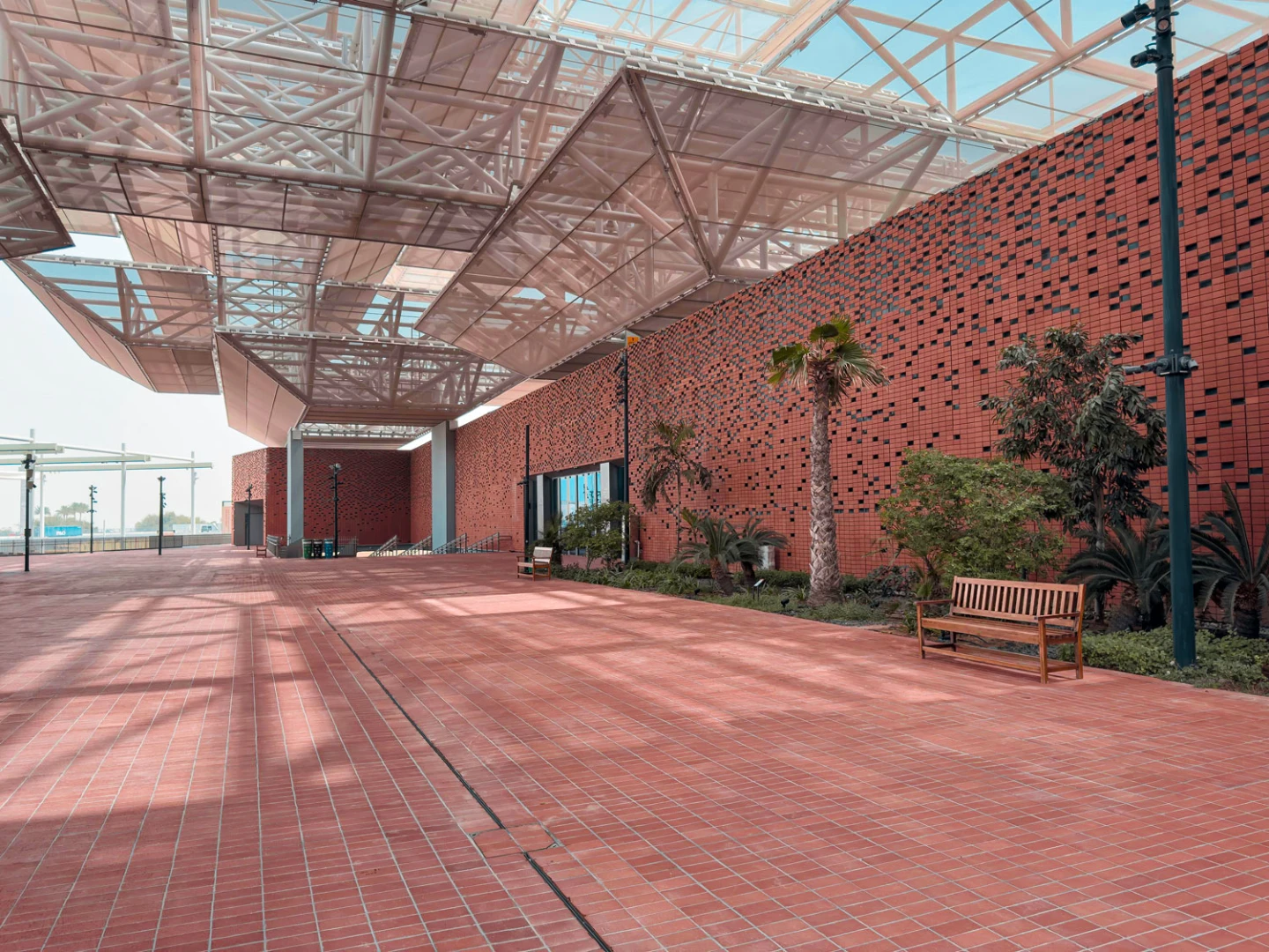 Connect Conference Centre Dubai exterior with red brick and glass canopy.