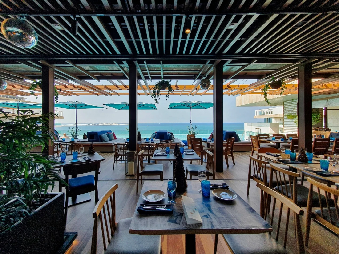 Elegant Tasca by Jose Avillez dining area with ocean view, Dubai.
