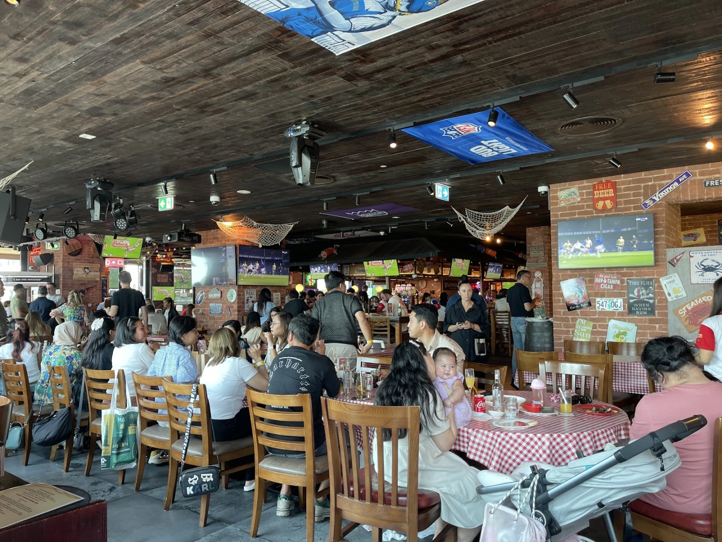 CLAW BBQ The Palm interior, bustling with diners, Dubai venue.
