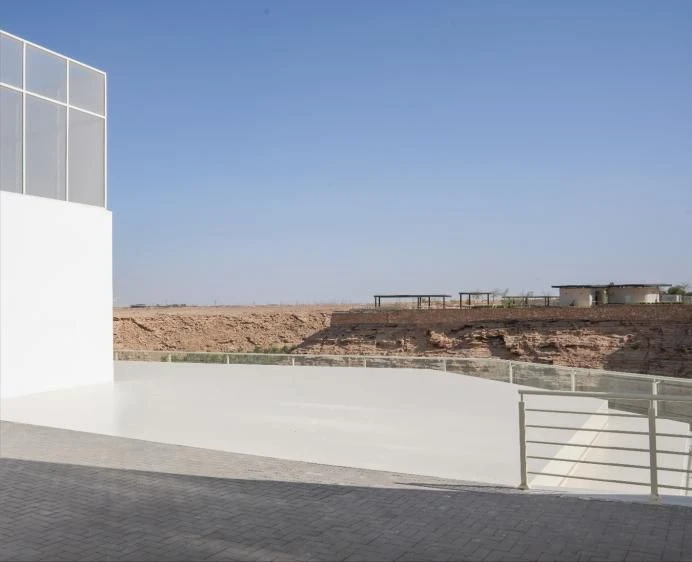 Jax District Riyadh exterior with clear sky and desert view.