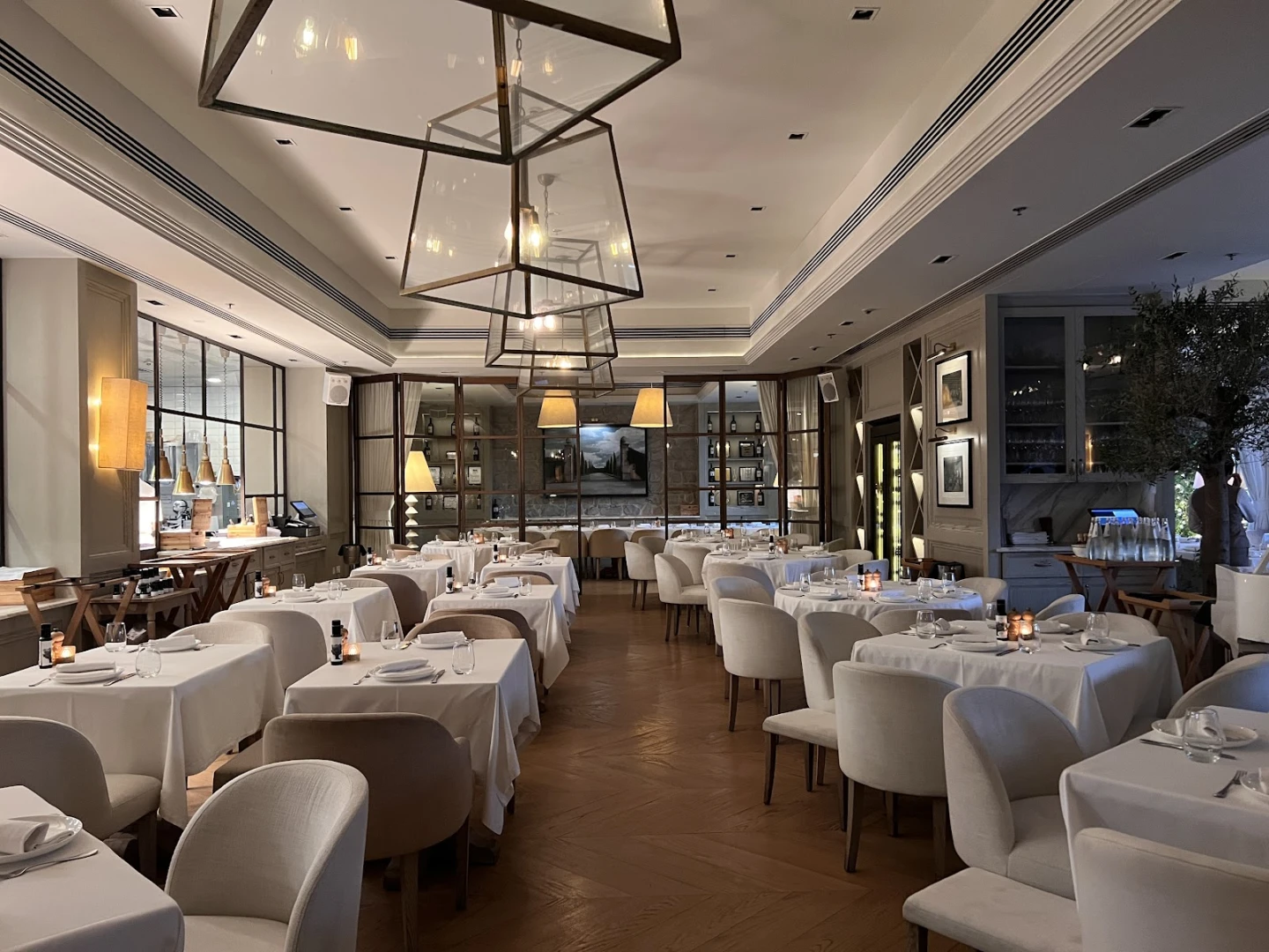 Elegant dining area at Il Borro Tuscan Bistro Dubai, set for events.