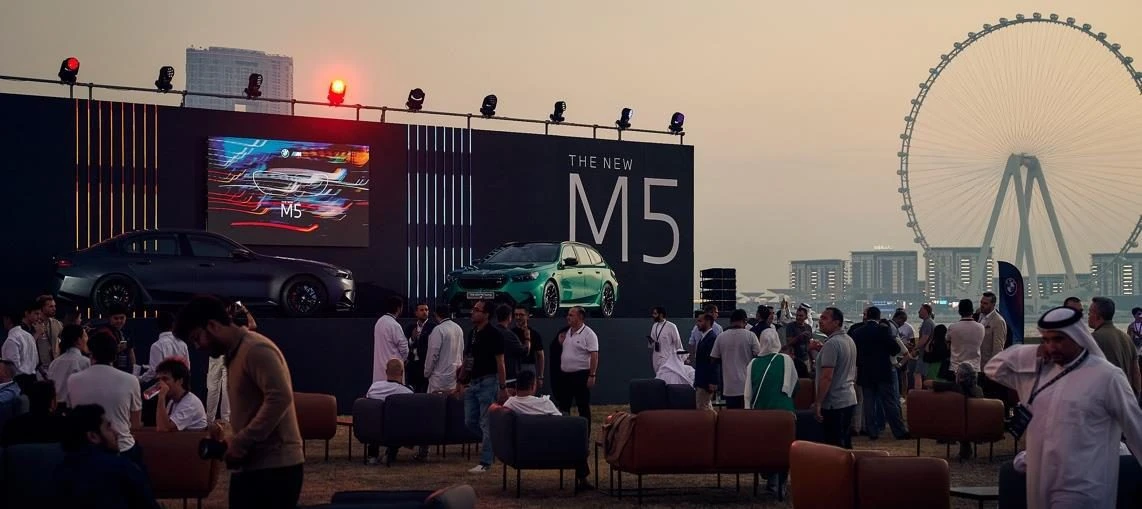 Outdoor event with cars and attendees at Skydive Dubai, Dubai, UAE