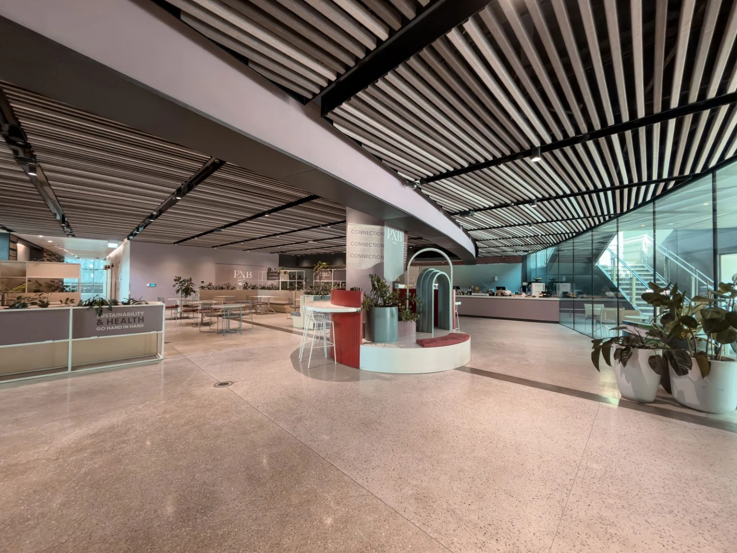 Modern interior with seating and plants at Terra, Expo City Dubai, Dubai, UAE