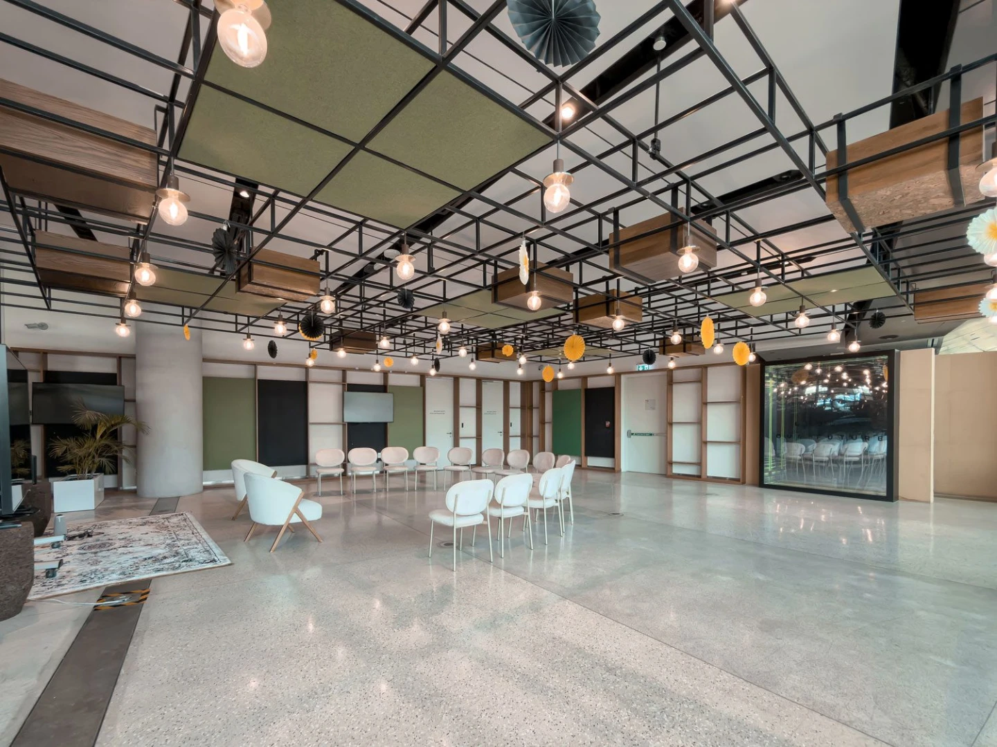 Spacious event room with modern decor at Terra, Expo City Dubai, UAE.