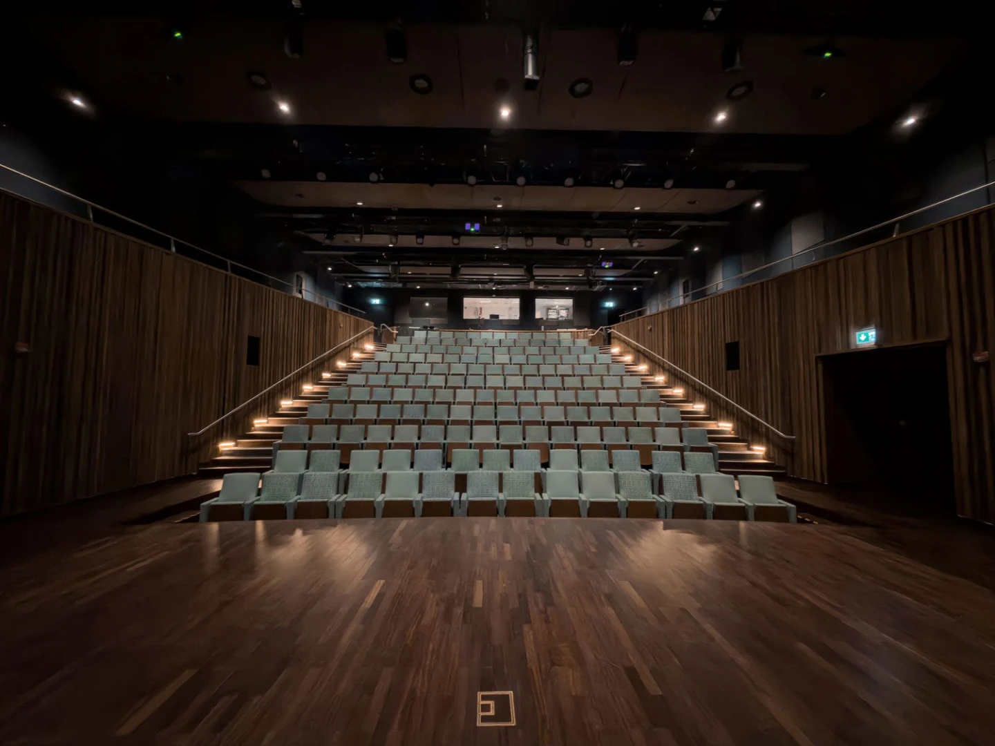 Auditorium seating with wooden accents at Terra, Expo City Dubai, Dubai, UAE