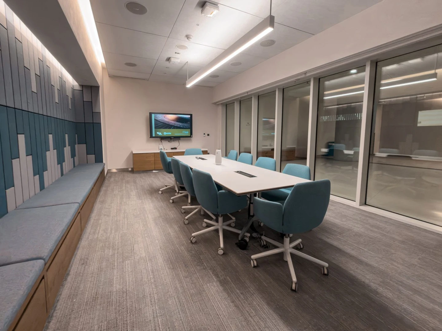 Modern conference room with blue chairs at Terra, Expo City Dubai, UAE