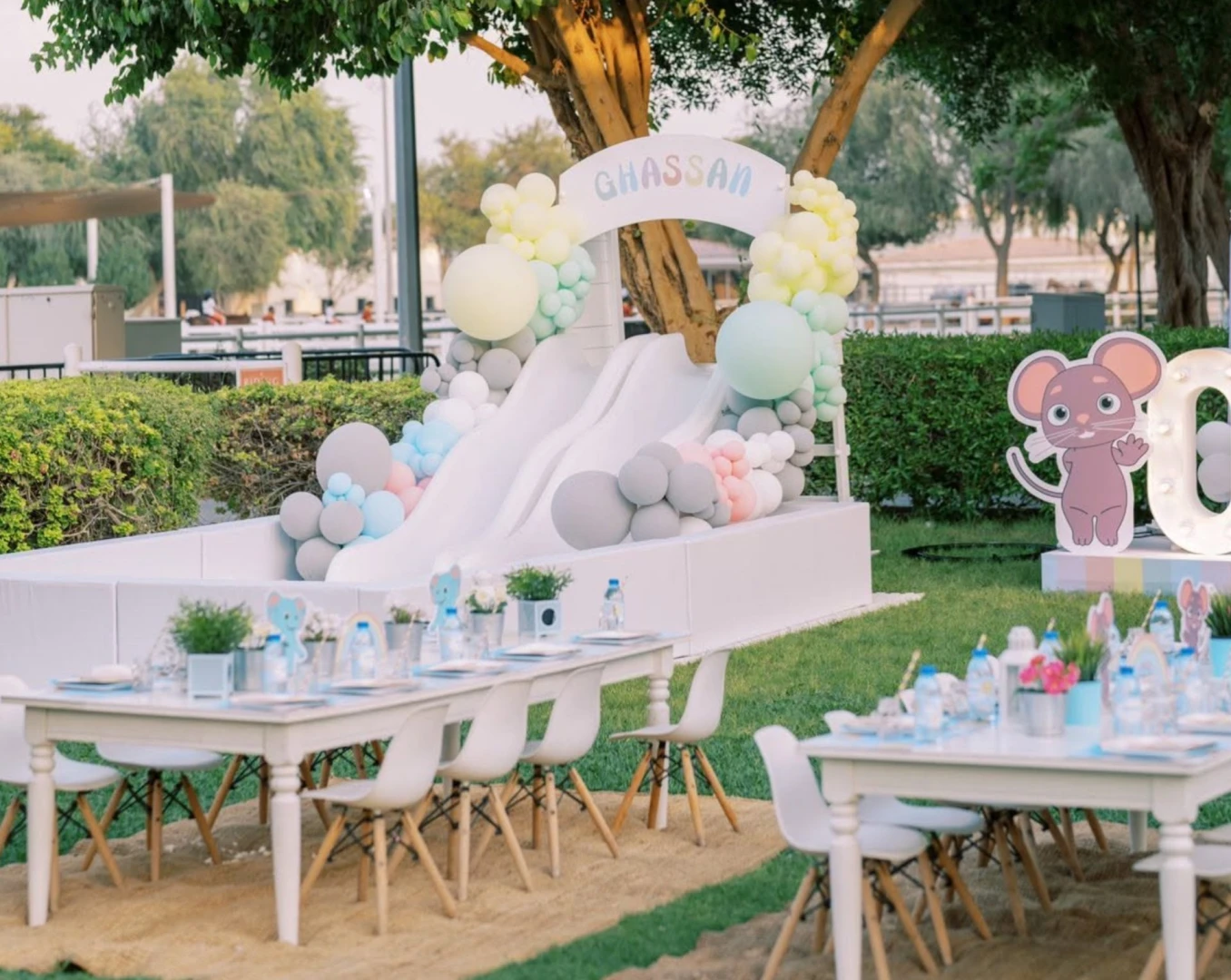 Children's party setup with slide and tables at Dubai Polo & Equestrian Club, Dubai.
