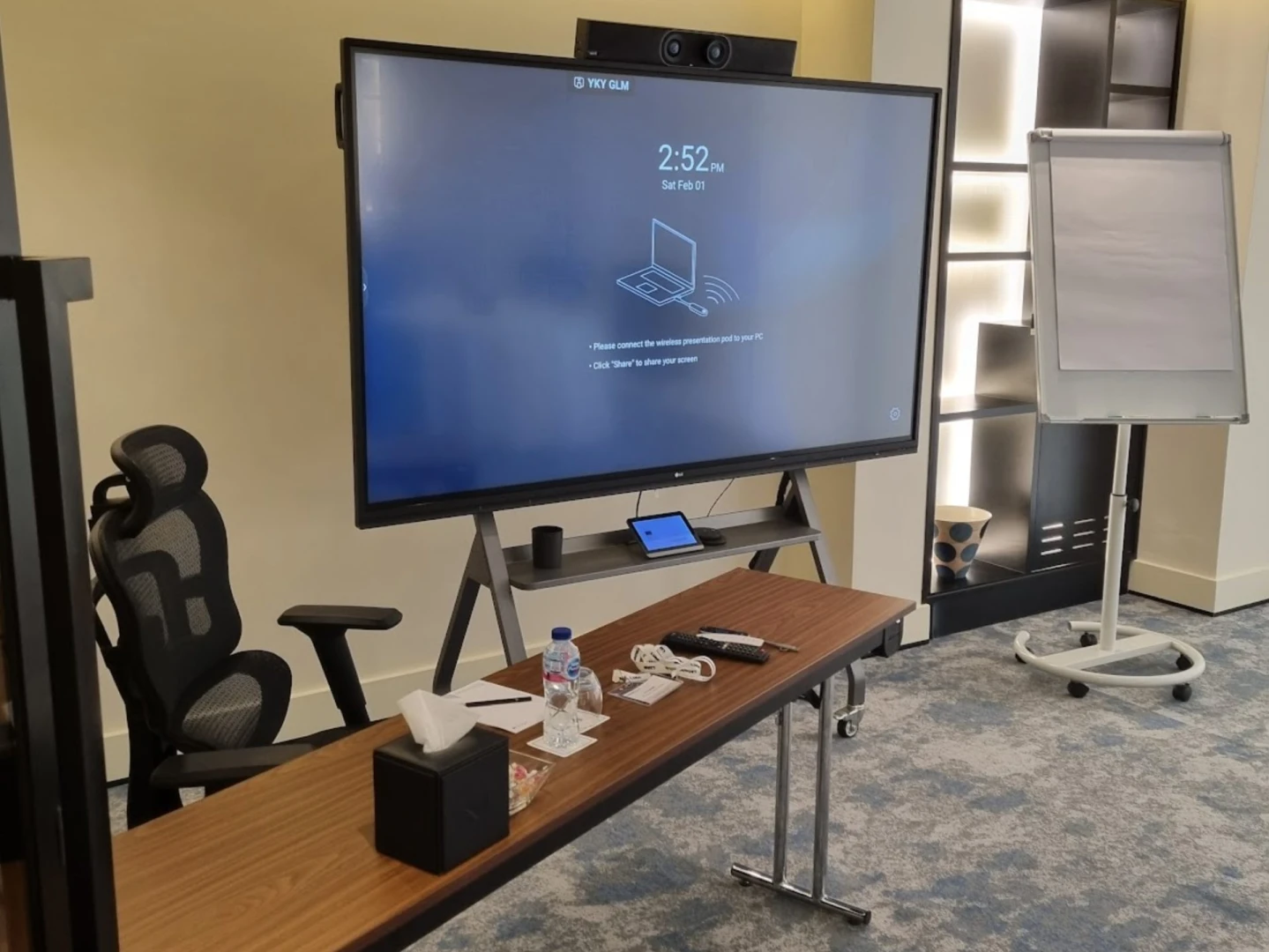 Conference setup with screen and flipchart at Nova M Hotel Riyadh Edge by Rotana.