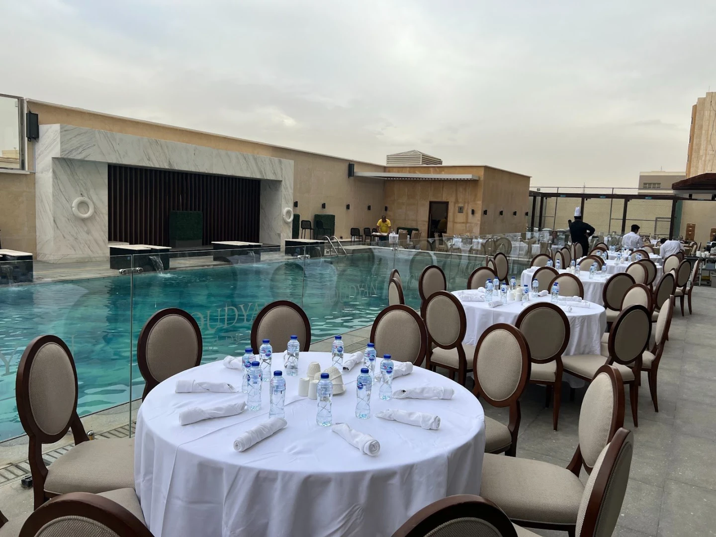 Poolside dining setup at Joudyan Olaya by Elaf, Riyadh, KSA.