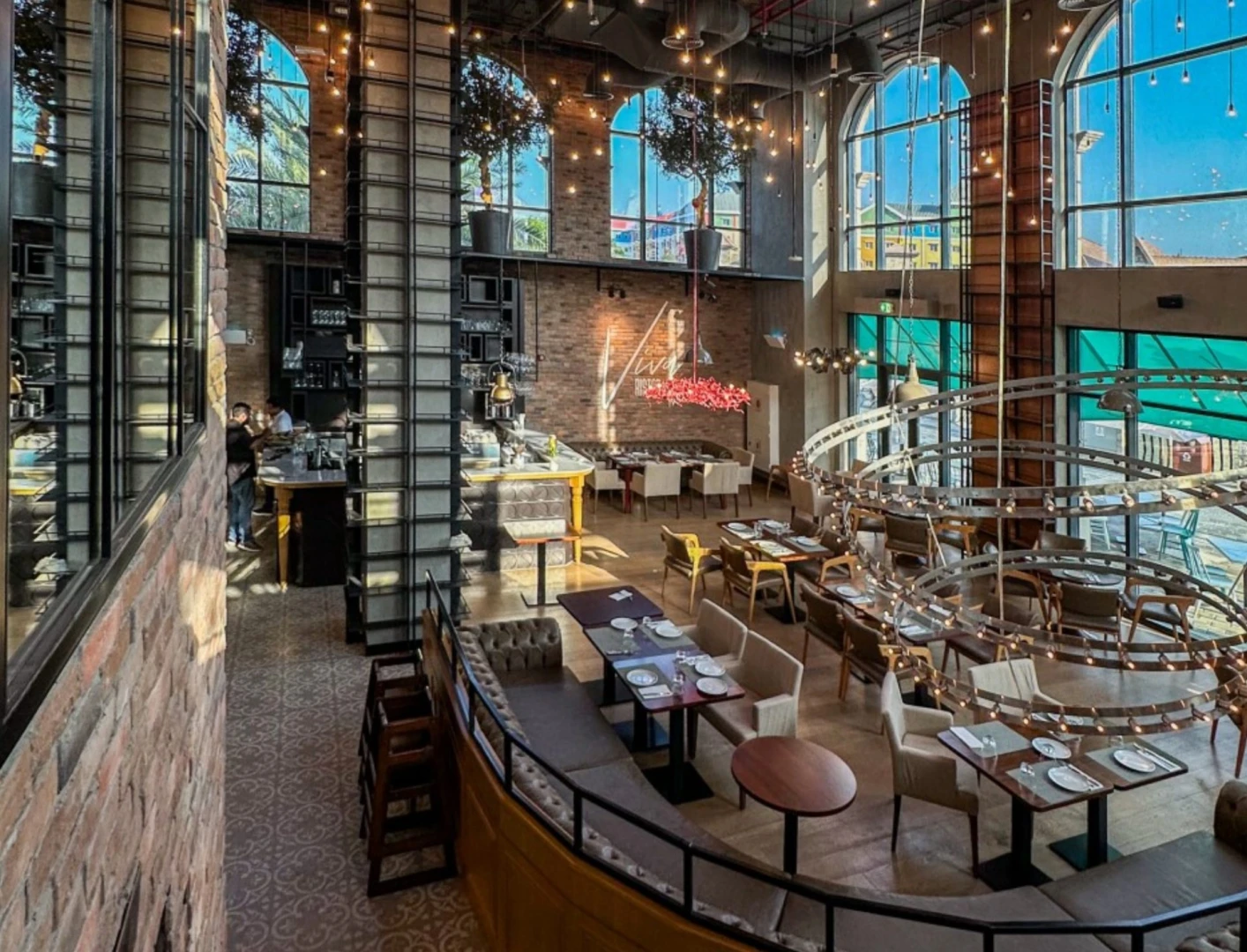 Elegant dining area with large windows at Dubai Parks and Resorts, Dubai, UAE.