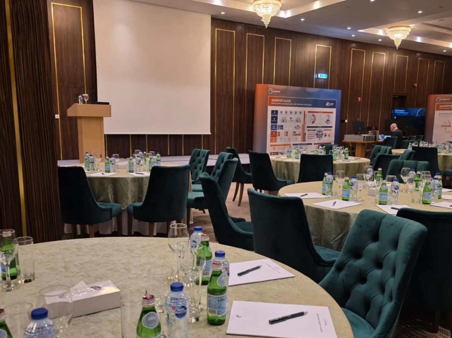Conference setup with round tables at Holiday Inn Riyadh al Malaz by IHG.