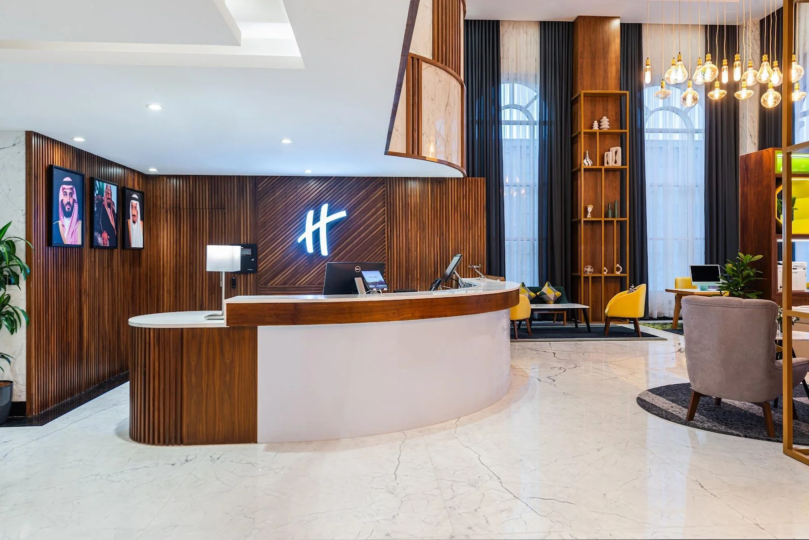 Elegant lobby with modern decor at Holiday Inn Riyadh al Malaz by IHG.
