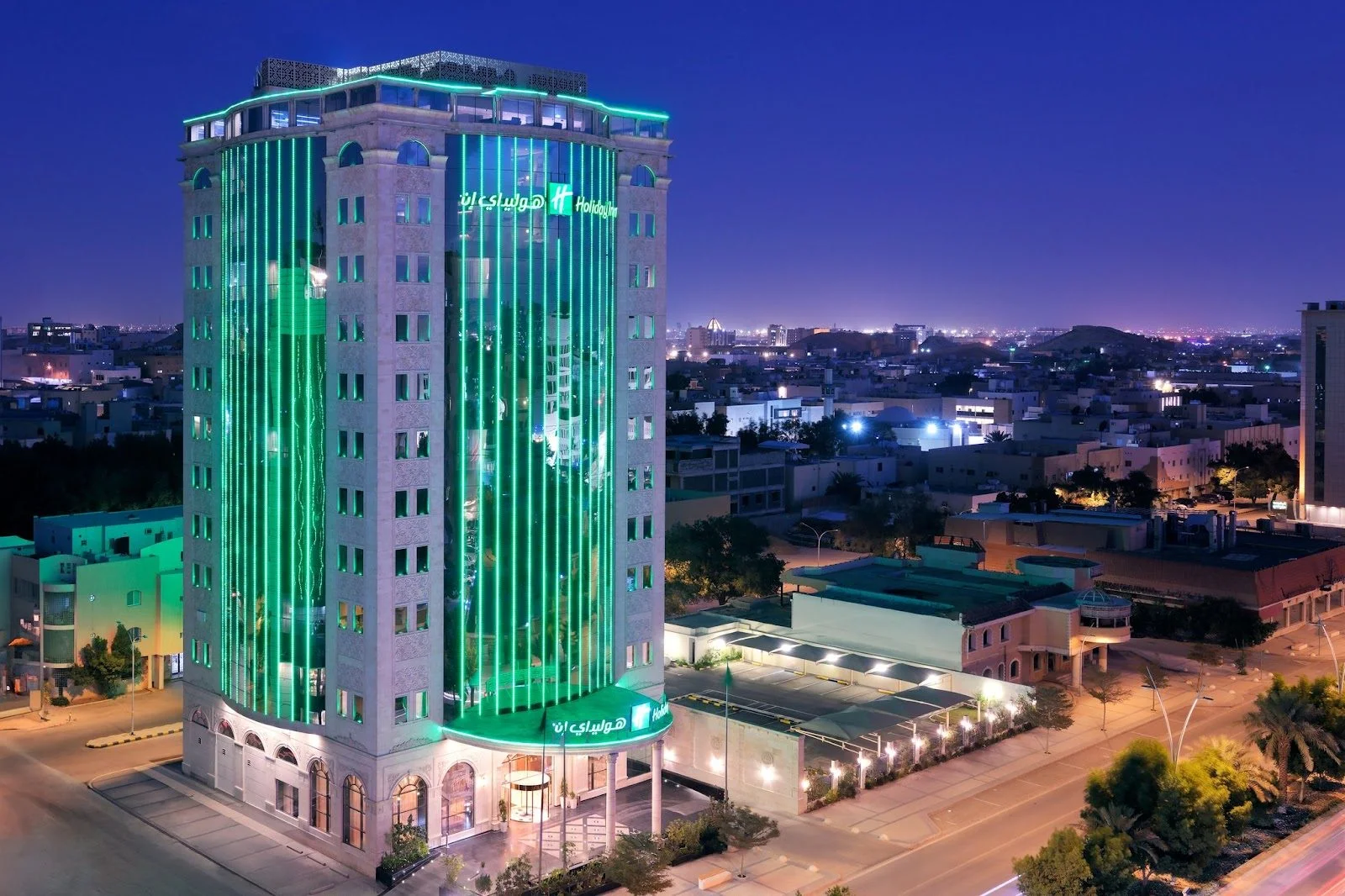 Illuminated building exterior at Holiday Inn Riyadh al Malaz by IHG, Riyadh, Saudi Arabia