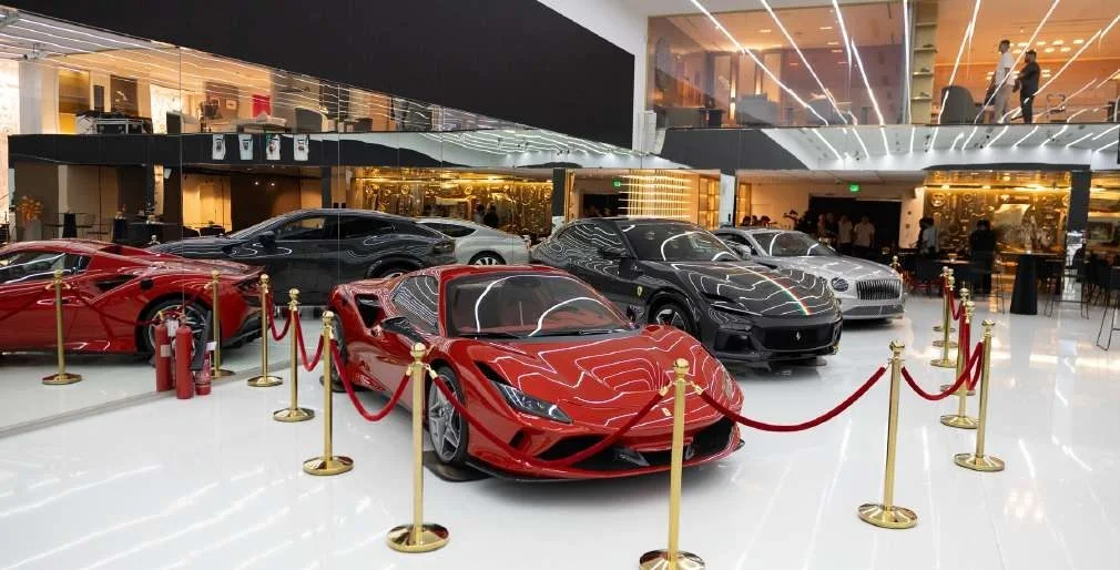 Luxury cars displayed at Aureum Club, Dubai, UAE.