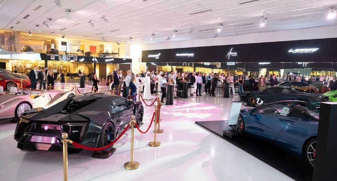 Luxury cars and guests at Aureum Club, Dubai, UAE