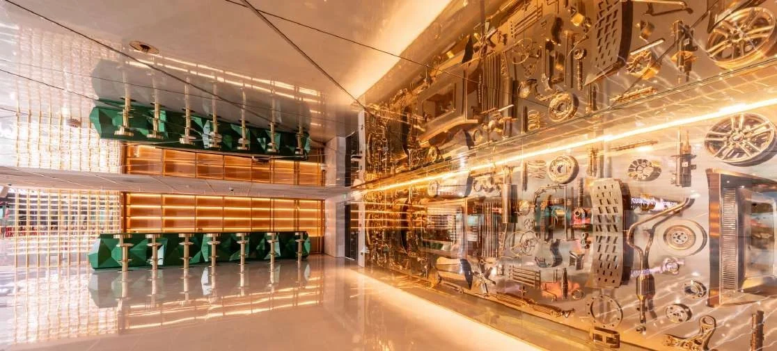Modern interior with gold accents at Aureum Club, Dubai, UAE