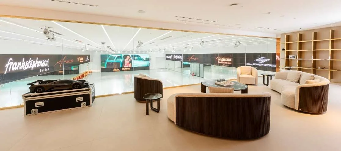 Luxurious seating area overlooking event space at Aureum Club, Dubai, UAE