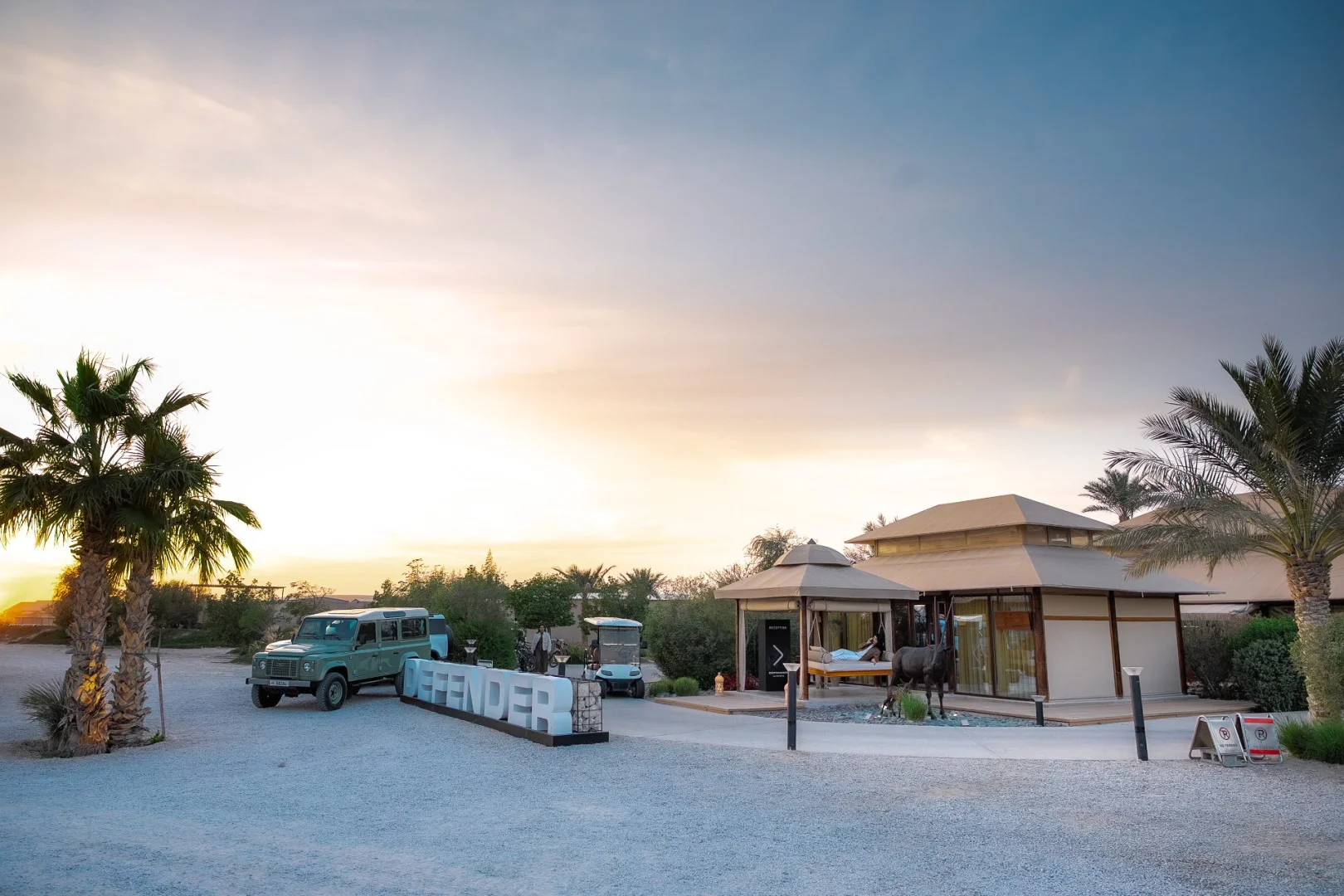 Sunset view of exterior at The Outpost Al Barari, Doha, Qatar